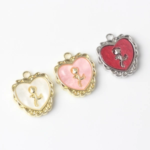 DIY heart pendants with rose detail in white pink and red colors for jewelry making