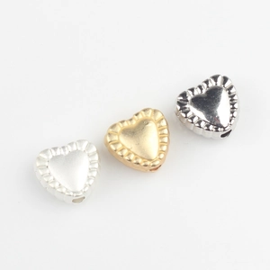 Alloy heart spacer beads with wavy edges in matte gold and silver for DIY jewelry