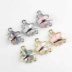 Set of star-shaped resin charms with saturn ring design for DIY jewelry making