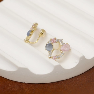 Boucles d'oreilles clips chatoyantes avec zircon rose et finition dorée pour femme