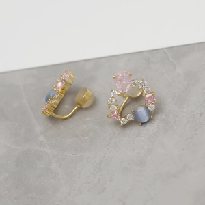 Boucles d'oreilles clips dorées en œil de chat avec zircon rose et coussinets en silicone