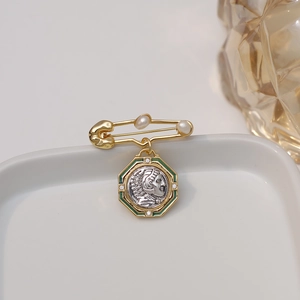 Retro Athena coin brooch with gold safety pin, pearls and green enamel accent