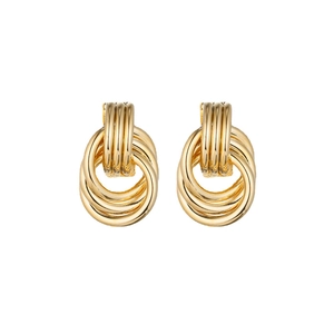 Minimalist gold interlocked knot earrings with high-polish finish on white background