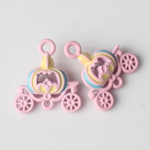 Detailed close-up of pink pumpkin carriage alloy charms for DIY jewelry accessories