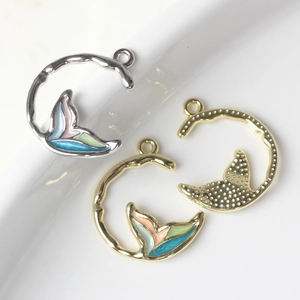 Colorful enamel mermaid tail charms in gold and silver finish for jewelry making