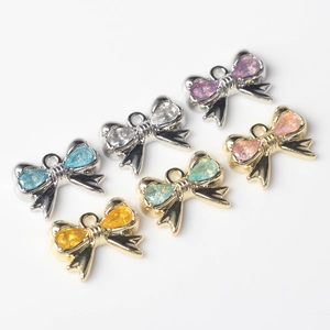 Set de 6 colgantes de lazo de aleación con pedrería de colores para hacer joyas