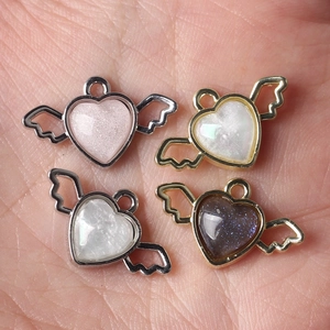 DIY alloy heart wing pendants with resin inlay in various colors for jewelry making
