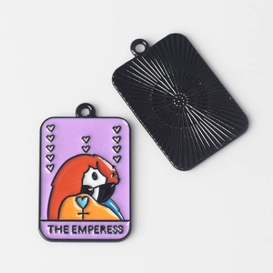 Detail of The Empress tarot pendant with purple enamel and textured black matte back