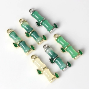 Set of 6 bamboo-shaped resin pendants with gold and silver metal frames for DIY jewelry