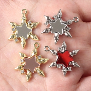 DIY hexagon star charms in alloy with rhinestones, set of four colors shown in hand