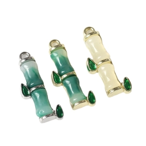 Bamboo style alloy pendants with resin inlay in silver and gold finishes for jewelry making
