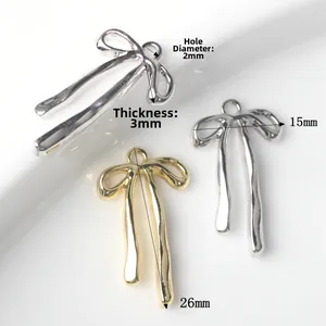 Ciondoli a fiocco in lega oro e argento per creazione gioielli fai da te da 26x15mm