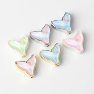 Colorful resin fish tail charms in gold and silver frames for DIY jewelry making