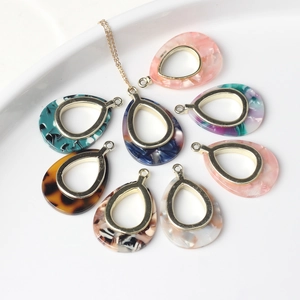 Teardrop resin pendants in assorted colors with gold metal frames for DIY jewelry making