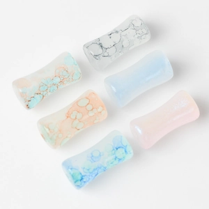 Artistic marble textured glass ear plugs in various colors for DIY jewelry crafts