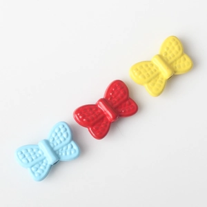 Colorful alloy bowknot charms for DIY jewelry making in blue, red and yellow finishes