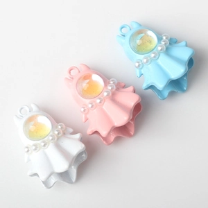 Detail showing colorful ghost pendants with faux pearls and transparent bead inserts