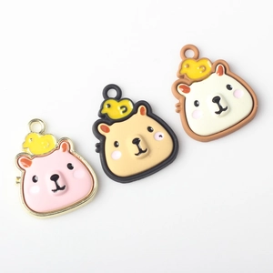 Three colorful alloy capybara pendants with yellow birds for DIY jewelry making