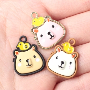 Three colorful alloy capybara pendants with yellow birds for DIY jewelry making