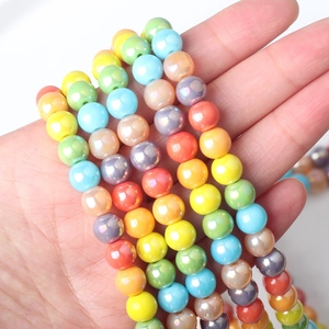 Macro shot of 8mm candy colored glass beads with pearl finish for DIY jewelry making