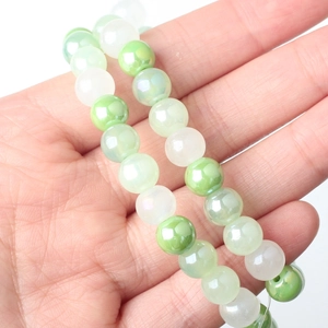 Macro view of 8mm candy color iridescent mermaid glass beads for DIY jewelry making