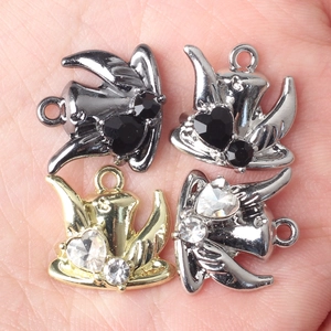 Halloween charm pendants with wings and heart zircon set in gold silver and black metal