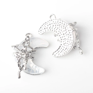 Detailed front and back views of silver moon pendants with star zircon and resin inlay