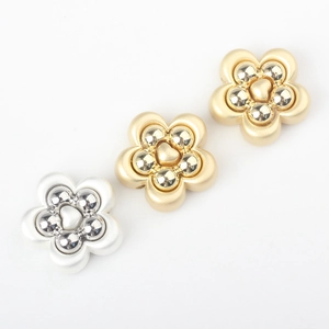Detailed view of alloy flower charms with heart centers for DIY jewelry making accessories
