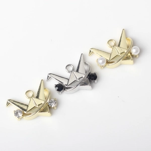 Three origami crane charms with gold and silver finishes, pearls and crystals for DIY jewelry