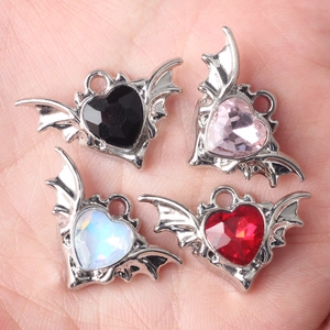 Set of four heart-shaped bat wing charms with colorful cubic zirconia for DIY jewelry