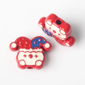 Macro shot of colorful clown beads for DIY jewelry making with smooth painted finish