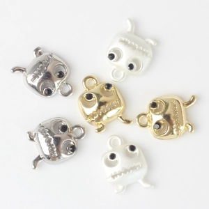 Cute monster alloy pendants with black bead eyes in gold, silver, and pearl white