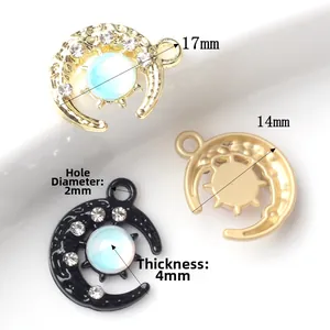 Pendentif lune minimaliste avec diamants et pierre bleue en finitions or et noir