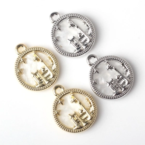 Round alloy castle coin pendant for DIY jewelry, featuring hollow architecture in gold and silver
