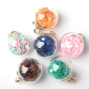 Set of six colorful glass ball charms with star sequins and golden alloy loops for DIY