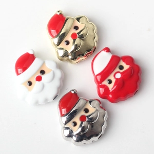 Set of four Santa Claus alloy charms with enamel finish for DIY jewelry and necklaces