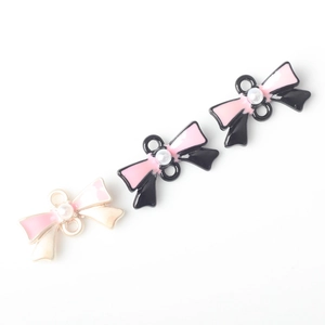 Pendentif nœud en alliage avec perle pour création de bijoux DIY en rose et noir