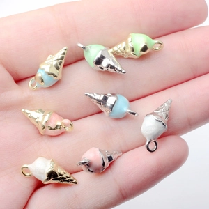 Colorful zinc alloy ice cream charms held in hand for DIY earring jewelry making