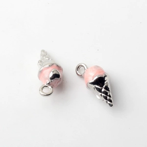Detailed macro view of pink enamel ice cream cone charms with silver metal ring hooks