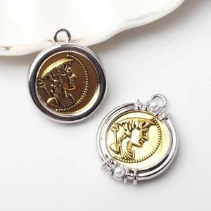 Vintage Hermes coin pendant in gold and silver alloy with faux pearl accents for DIY jewelry