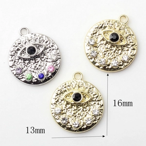 Golden and silver evil eye charms with colorful rhinestones in 13mm and 16mm sizes