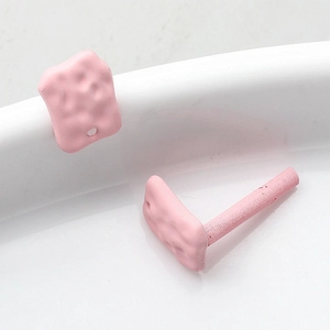 Pink matte cookie-shaped geometric DIY earring charms with a soft textured surface