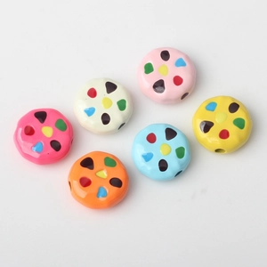 DIY colorful bean beads for jewelry making in six vibrant colors on white background