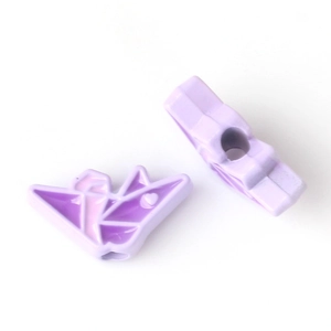 Detail of purple origami crane charms with enamel finish and small heart patterns