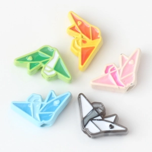 Set of five colorful origami crane beads for DIY jewelry making with enamel coating