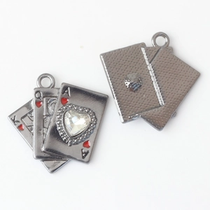 Detail of playing card alloy pendants with heart rhinestone and textured back surface