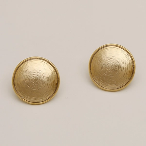 Minimalist gold round stud earrings with vintage concentric circular texture and polished finish