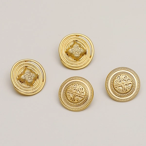 Set of 4 vintage matte gold metal buttons featuring embossed celtic and floral patterns