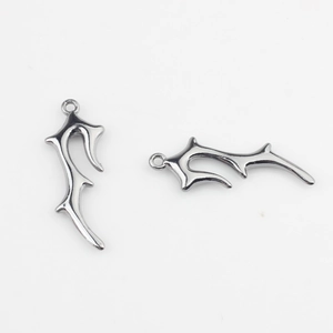 Detail of silver alloy branch pendants with liquid metal style for DIY jewelry making