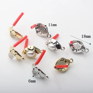 Detailed view of geometric alloy earring bases with white resin inlays for DIY jewelry